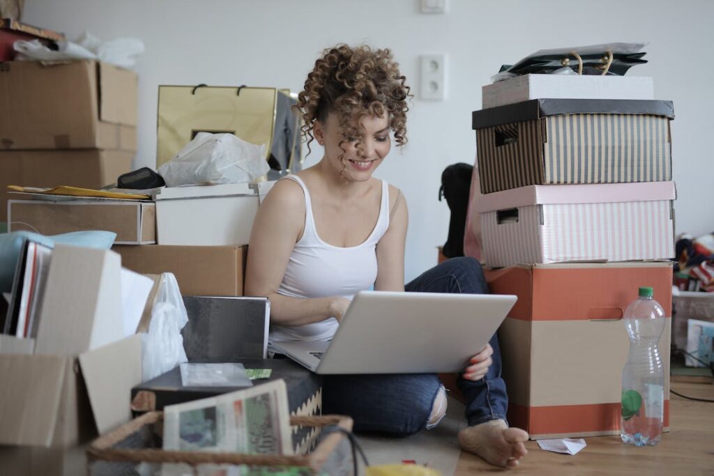 Woman decluttering her belongings before a move